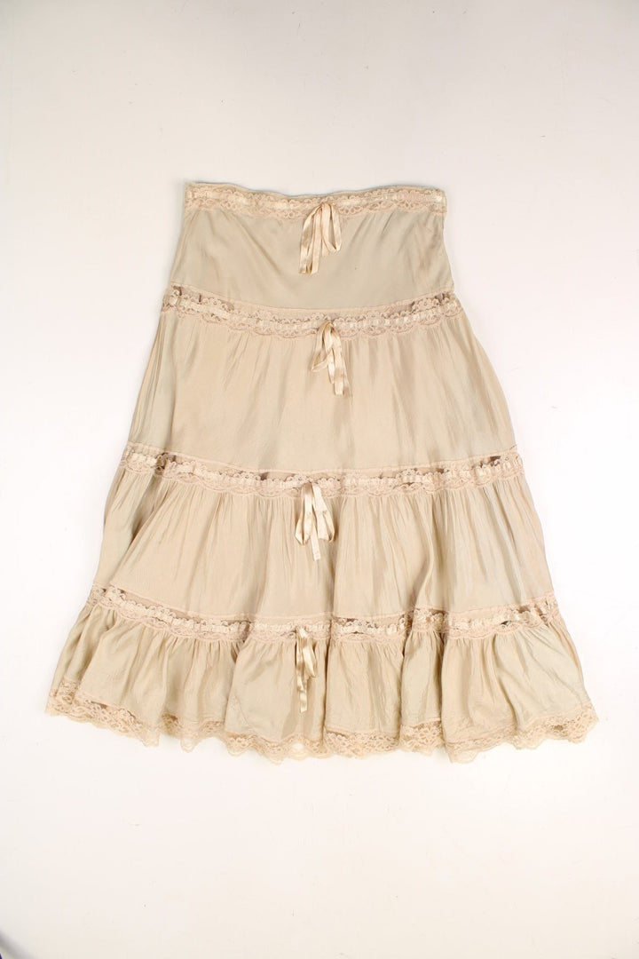 Y2K maxi Skirt  in tan with lace and ribbon detail.