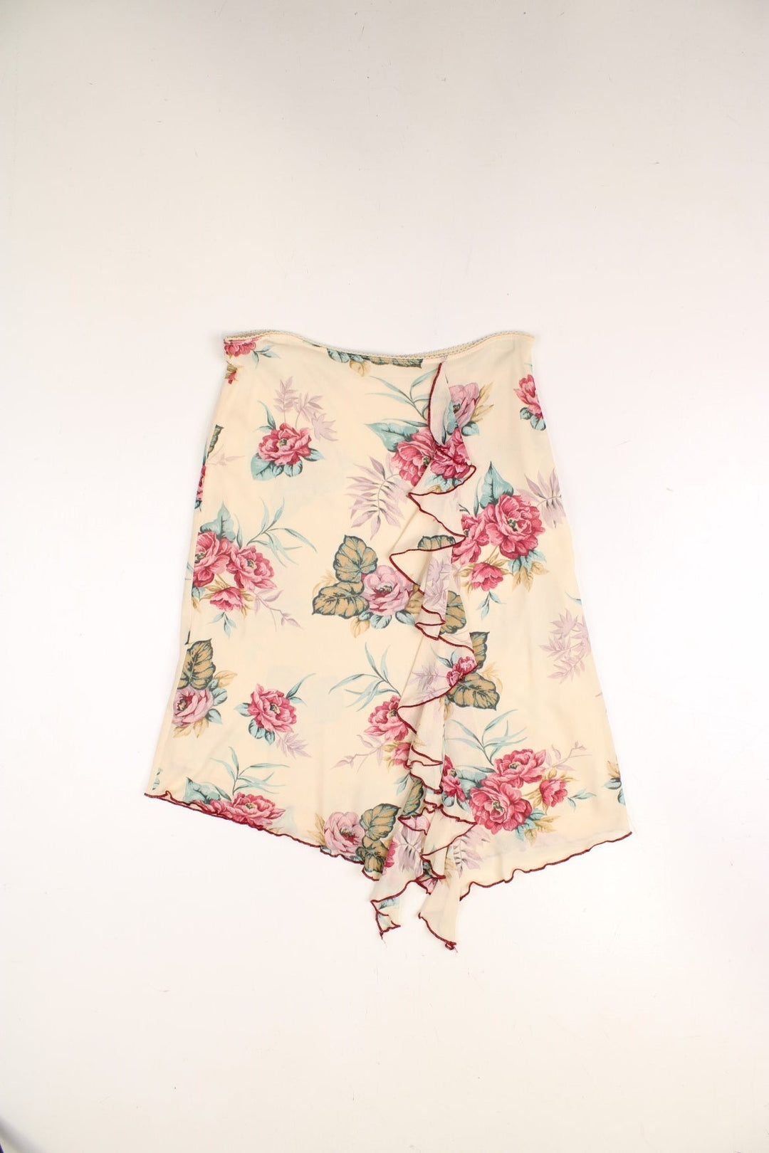 Y2K Floral Skirt in cream with pink flowers. Featuring ruffle detail.