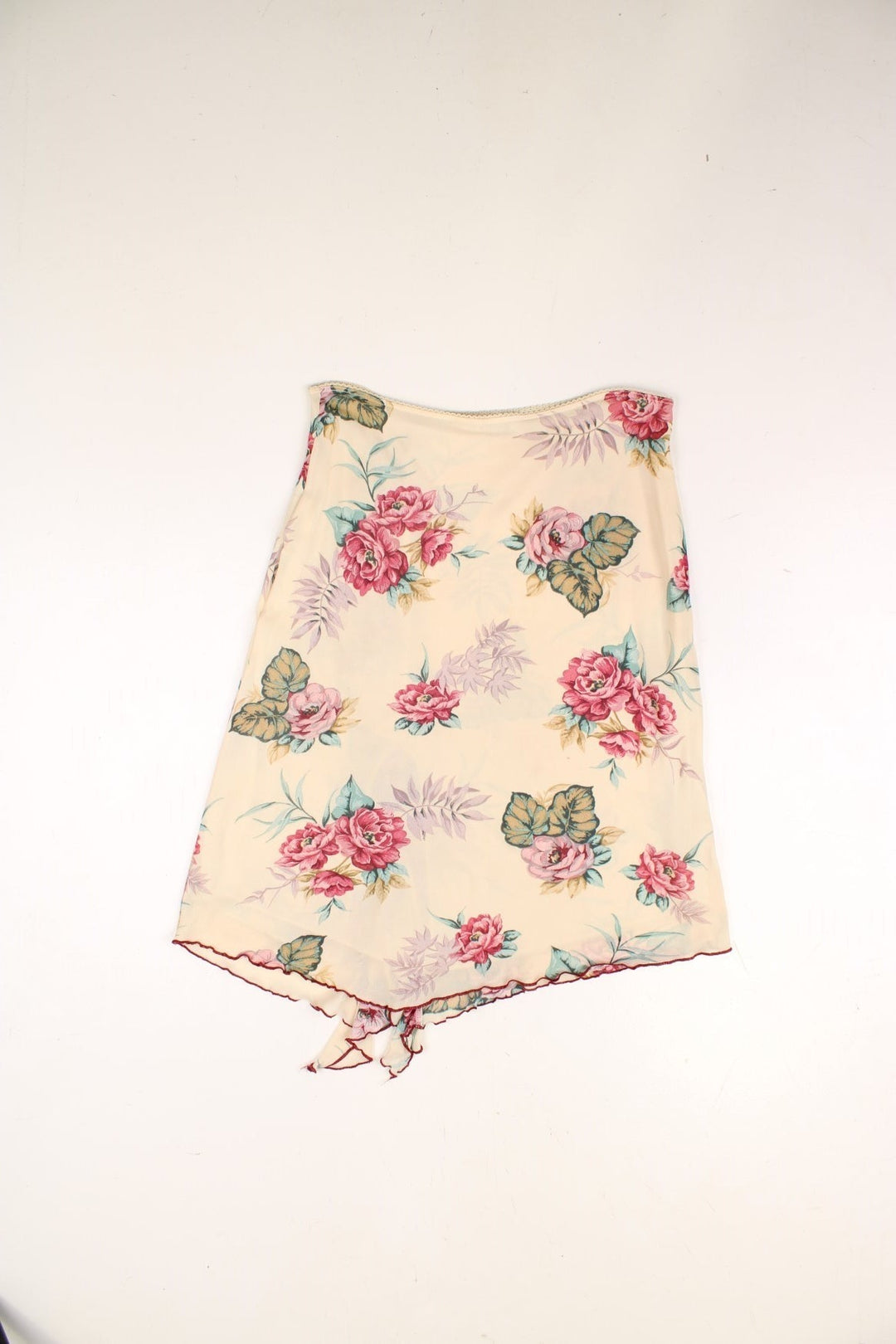 Y2K Floral Skirt in cream with pink flowers. Featuring ruffle detail.