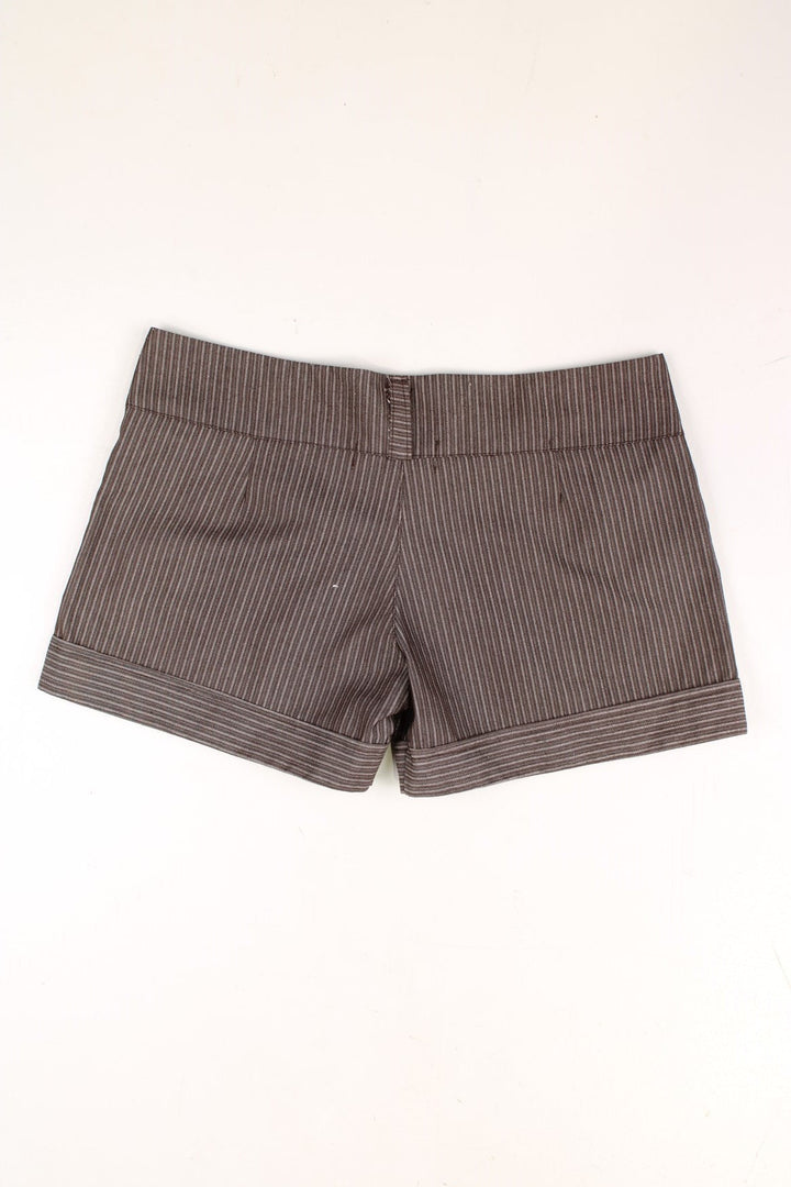 Y2K pinstripe shorts in  with pockets and button and zip closure.