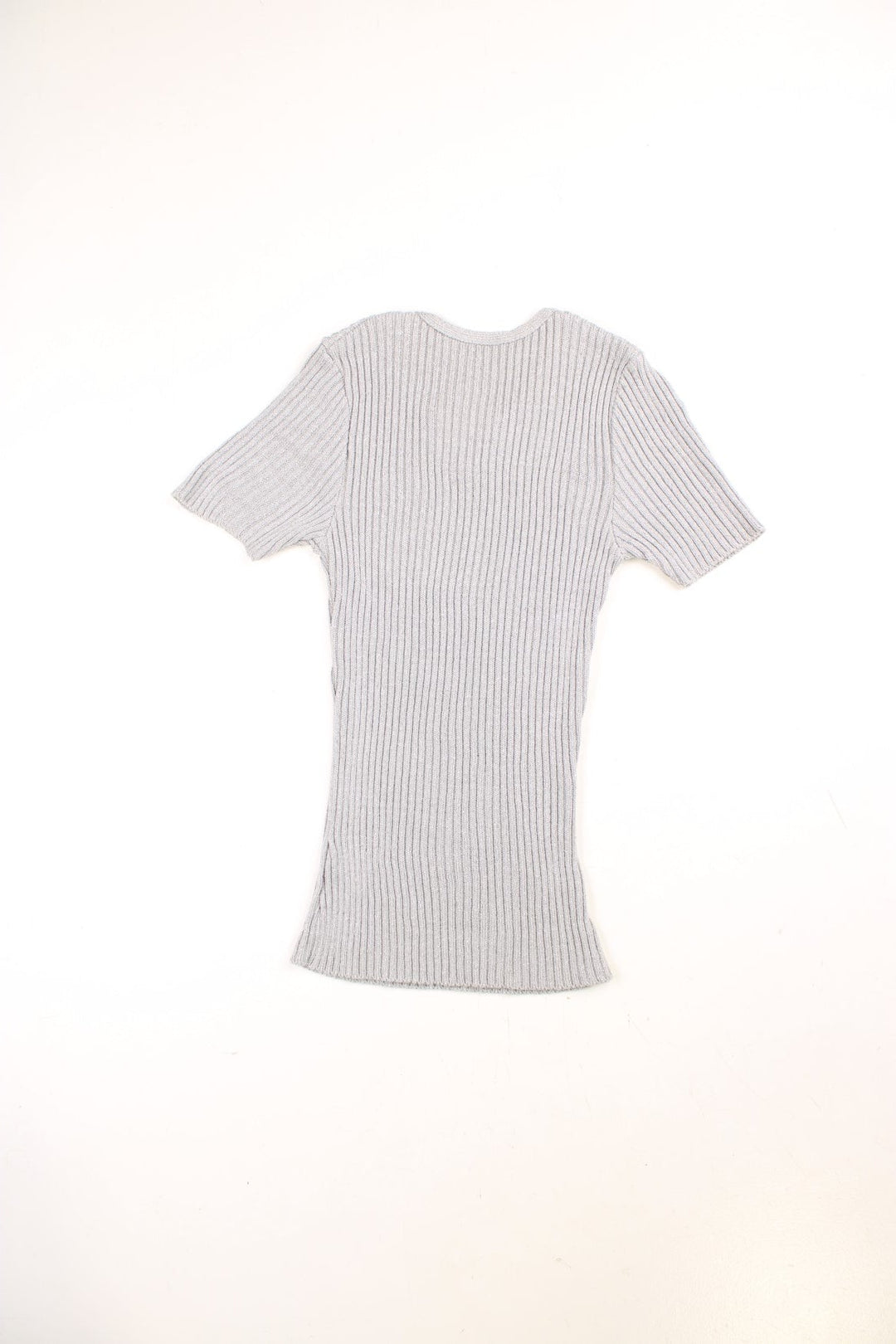 Y2K short-sleeved knit top in a stretchy ribbed grey fabric with silver sparkles and a silver chain across the neckline with three cherub charms. 