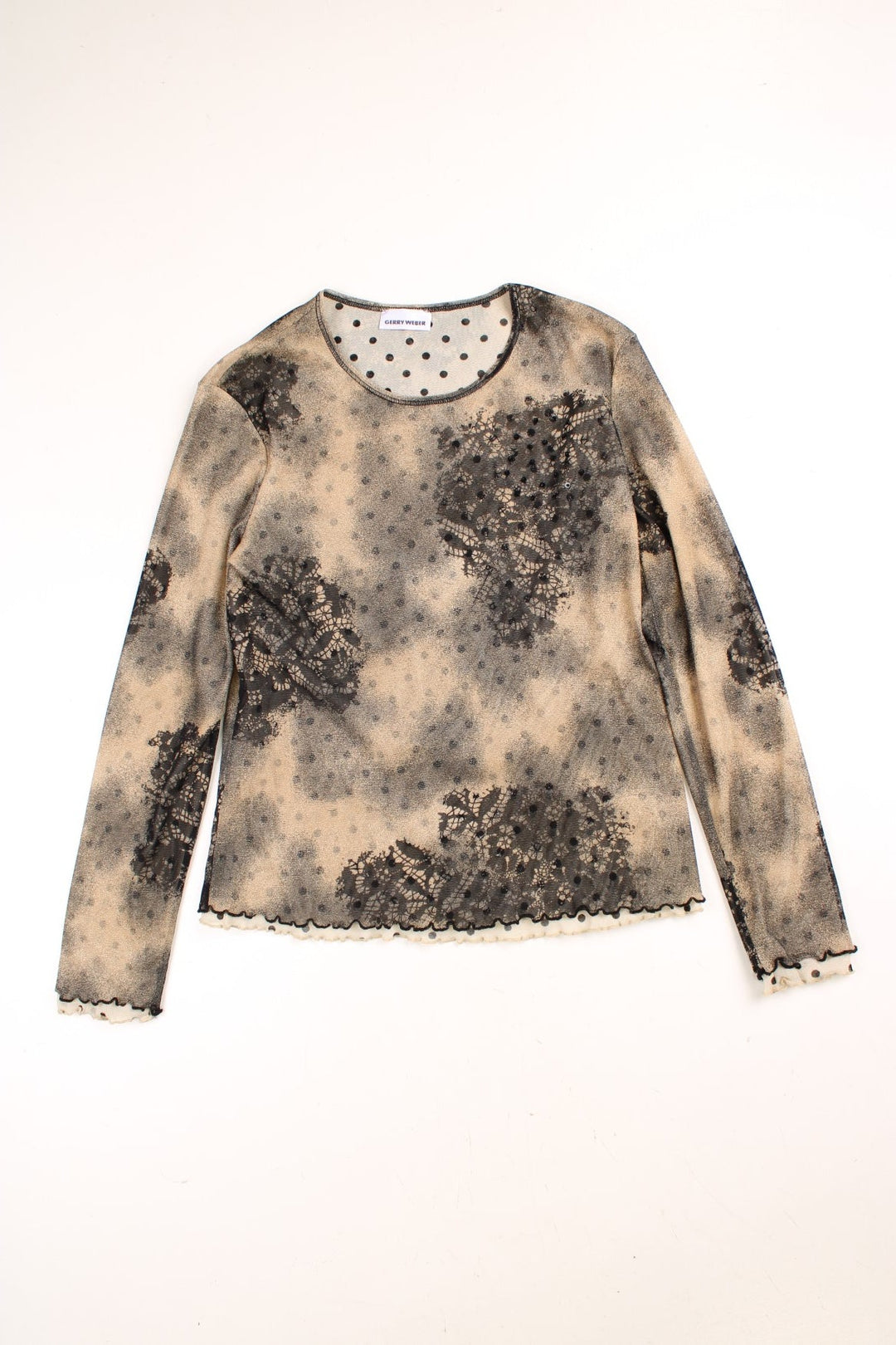 Y2K Gerry Weber mesh top in a tan and black with white polka dot under layer, a black and tan abstract design mesh outer layer with black sequins, and a lettuce hem.