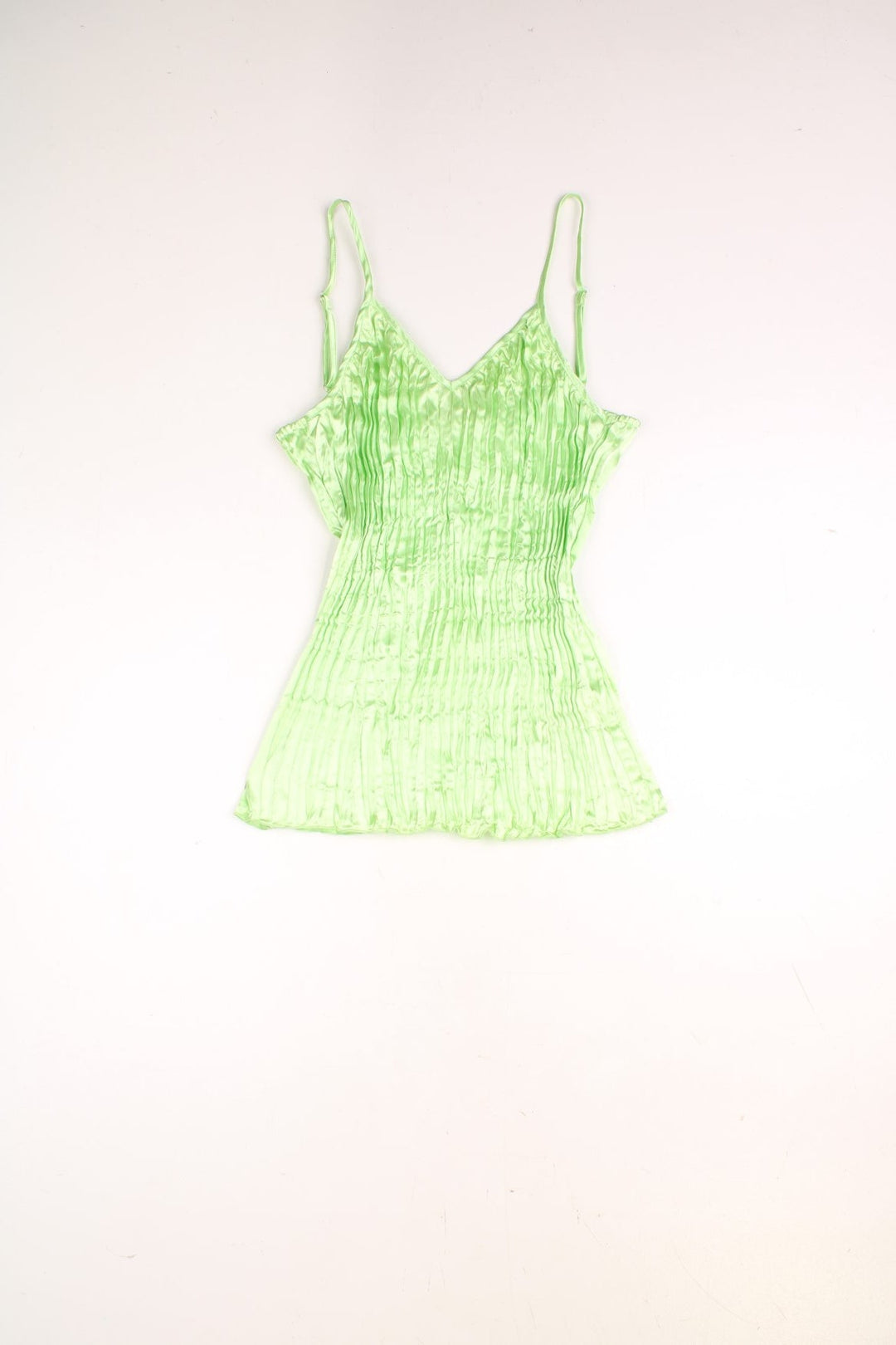 Y2K cami top in shiny green pleated fabric by Savida. 