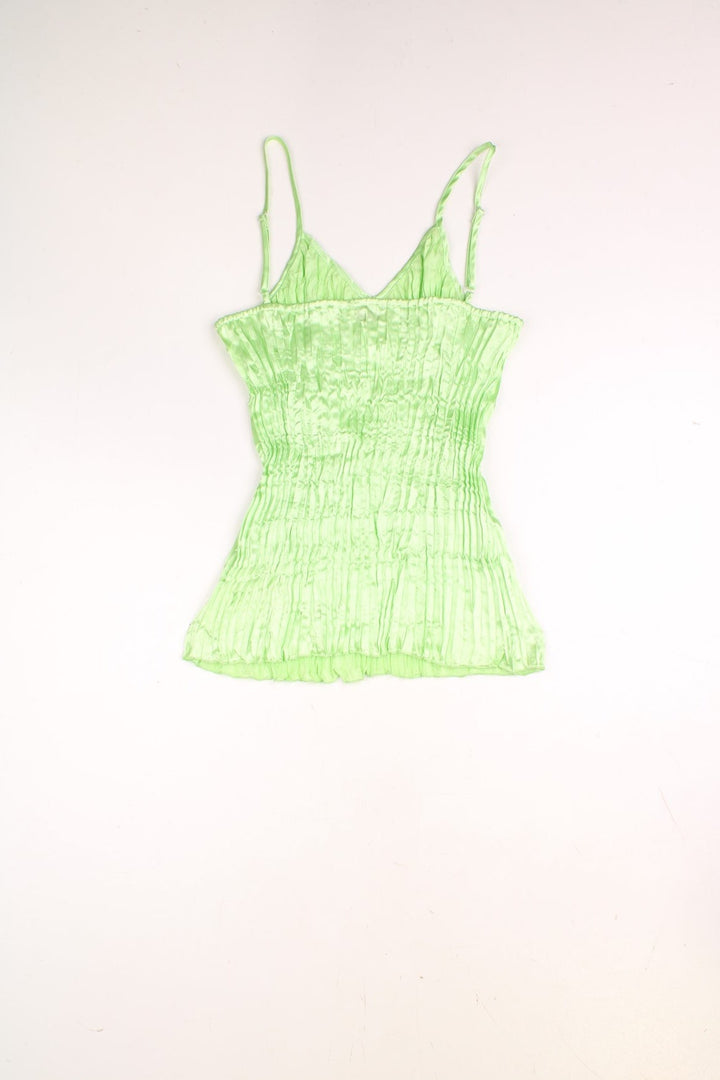 Y2K cami top in shiny green pleated fabric by Savida. 