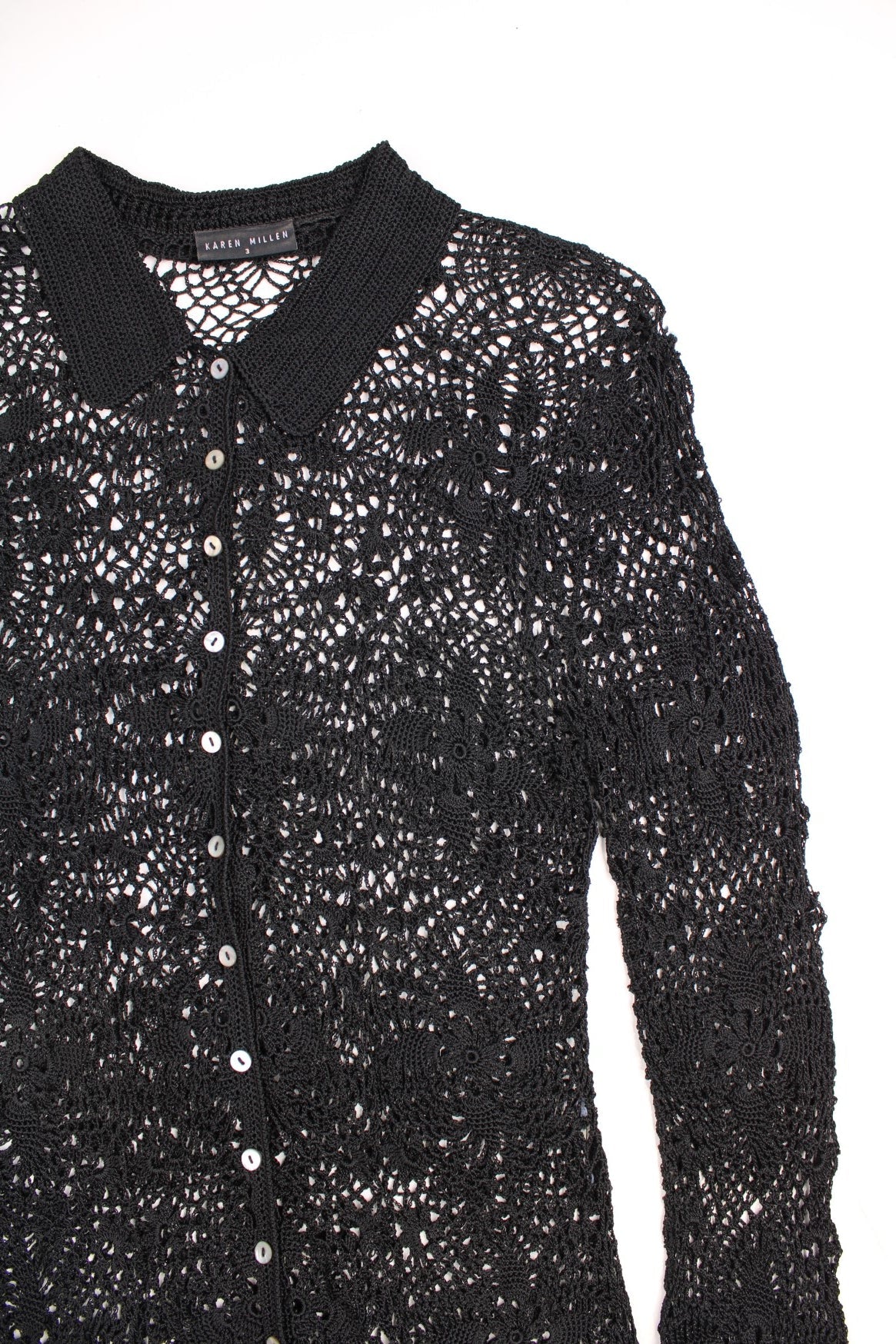 Karen Millen black floral crochet blouse with pearl-effect buttons. 