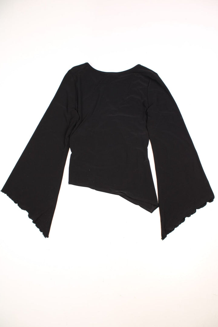 Joseph Ribkoff black wrap top with lettuce hem bell sleeves and diamante belt detailing. 