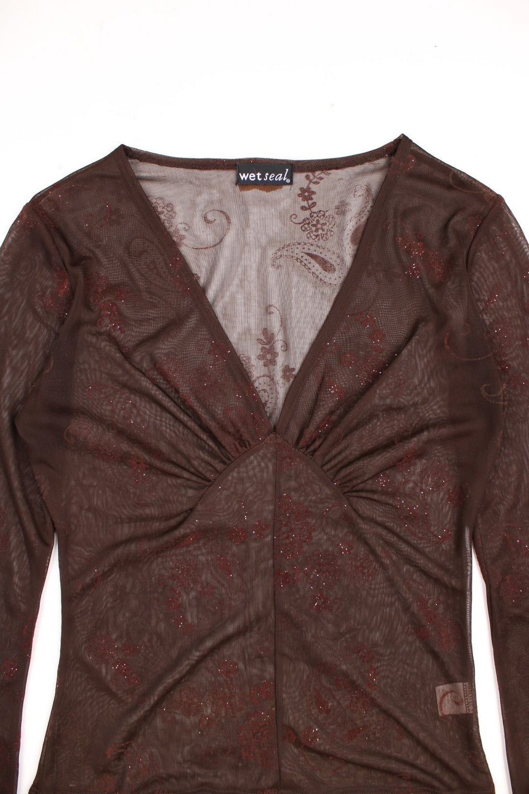 Wet Seal brown mesh v-neck top with a subtle glittery floral pattern, ruching on the bust, and bishop sleeves with ribbon ties at the cuff. 