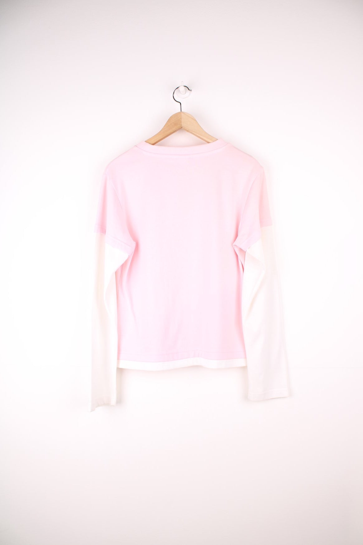 Reebok long sleeved top in pink and white with embroidered spell out logo across the chest. 