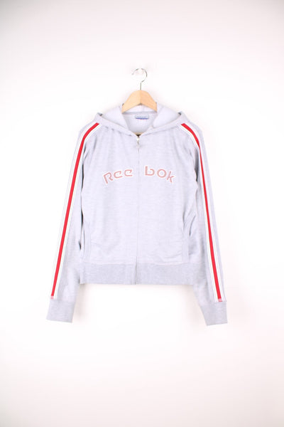 Grey and red Reebok zip through hoodie with embroidered spell out logo across the chest.
