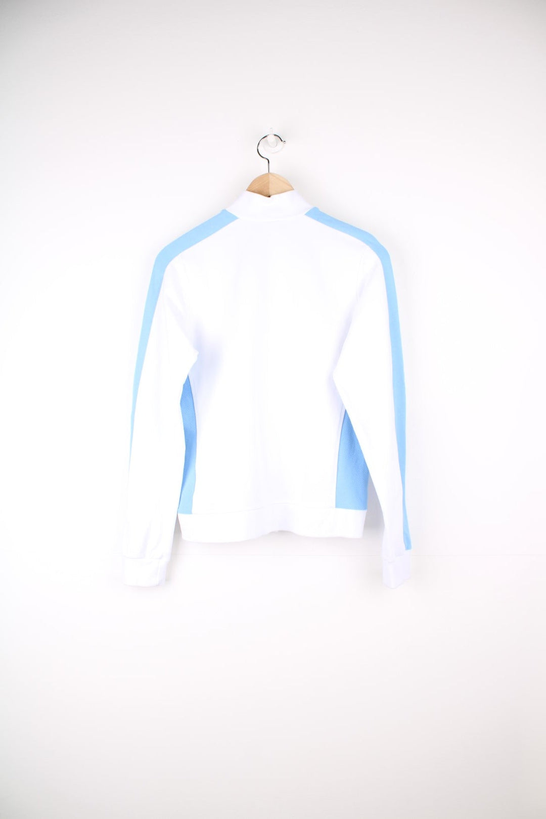 White Reebok zip through sweatshirt with blue stripe down each sleeve and puff printed logo.