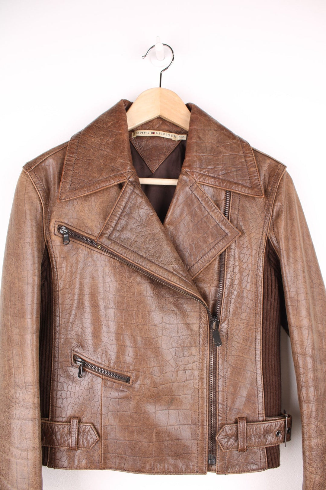 Tommy Hilfiger Leather Jacket in a brown colourway with a cracked crocodile print pattern throughout, the sides, arms and cuffs are a corduroy material, zip up with a big collar, and has two pockets on the front. 