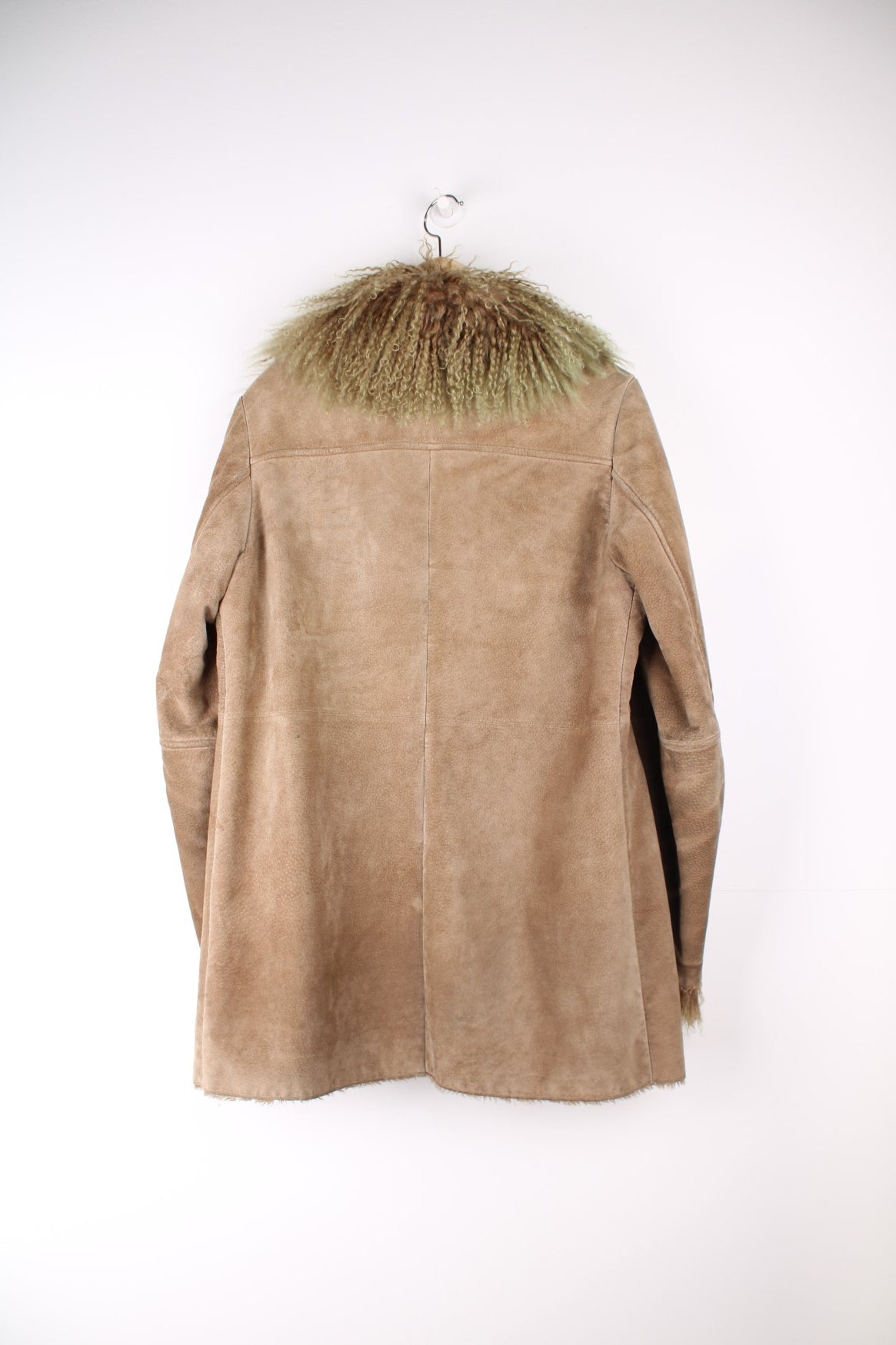 Vintage Afgan Coat in a brown colourway with a tanned / green fur lining on the collar and around the jacket, button up and has side pockets.