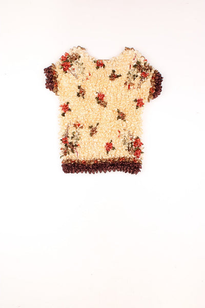 Yellow 90s popcorn top with red floral print.