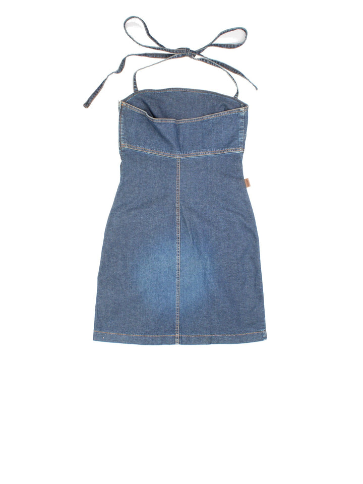 Y2K Moschino denim tie-up halter neck mini dress in blue with embroidered hearts on the front and a side zip.