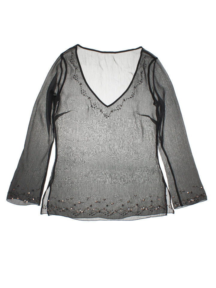 Y2K sheer top in black with bead and sequin detailing around the hem, collar, and cuffs.