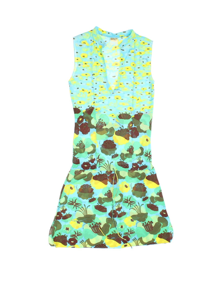 Y2K Miss Bikini mini dress/ beach cover-up in a blue, green and yellow floral print with a drawstring waist.