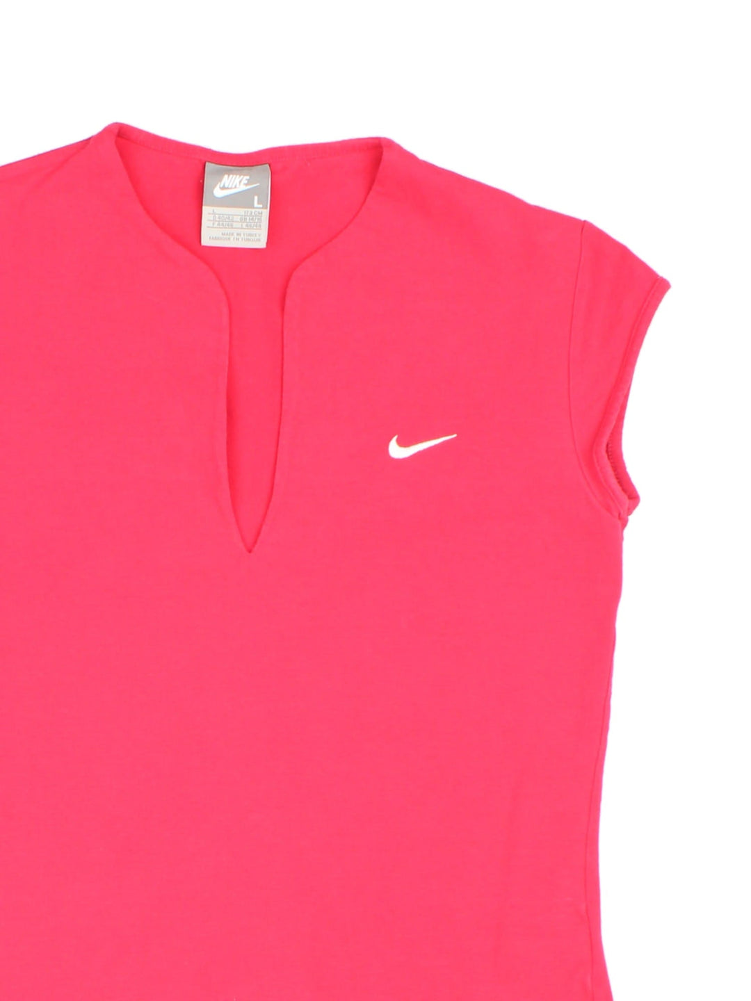 Vintage Y2K Nike T-Shirt in a pink colourway with the Nike logo embroidered on the front. The top has cap sleeves and a low v neck collar. 