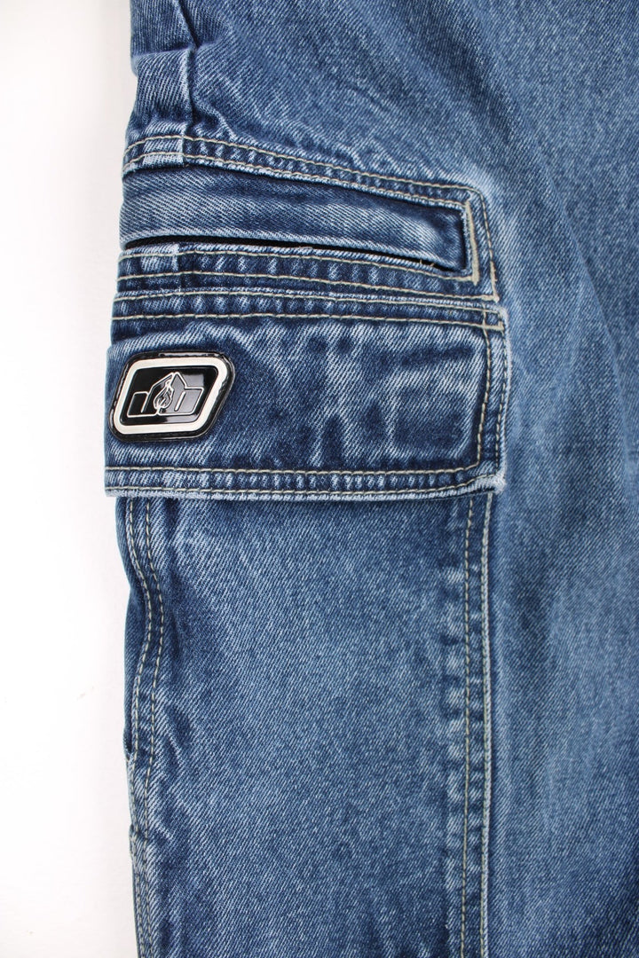 Johnny Blaze  Baggy Cargo Jeans in  colourway with multiple pockets and the logo embroidered on the pockets.