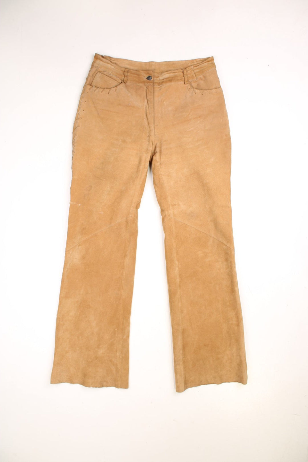 Y2K Western Leather Trousers in a tan brown colourway with multiple pockets, and has cross stitching tassels down the side of the legs and round the back.