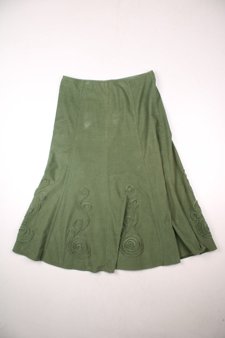 Y2K Marks & Spencer fine corduroy A-line maxi skirt in green with applique swirl designs .