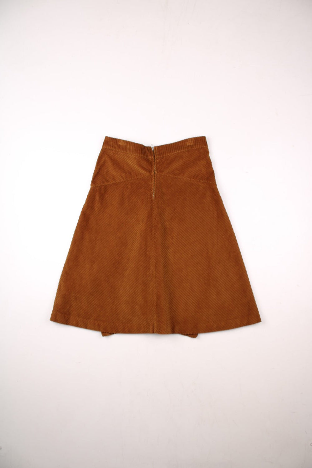 Y2K panelled corduroy midi skirt in tan with a small slit at the hem and zip closure by Dixie.