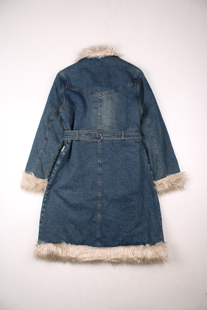 Y2K denim afghan coat in a mid blue wash: quilt lined with faux fur trim, multiple pockets, hook and eye closure, and a belt, by Hongma Fushi.