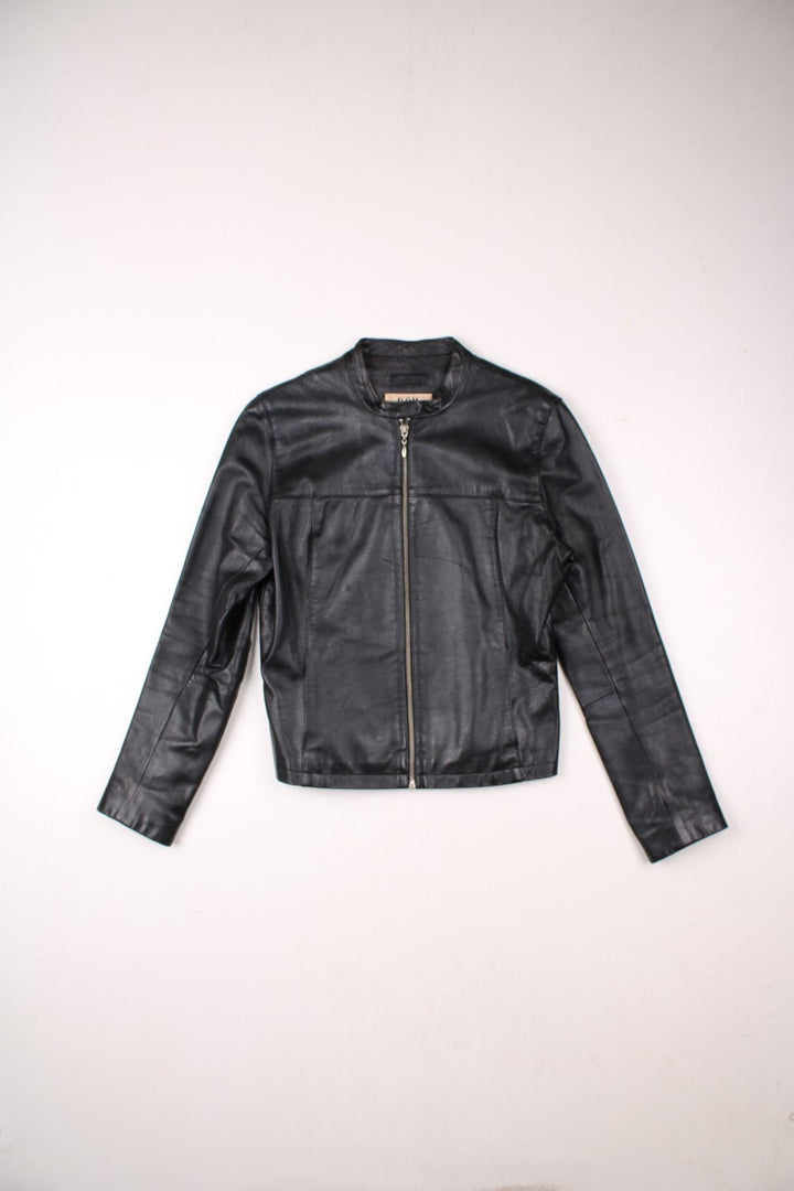 Y2K Bay collarless real leather jacket in black with two pockets and zip and snap closure.