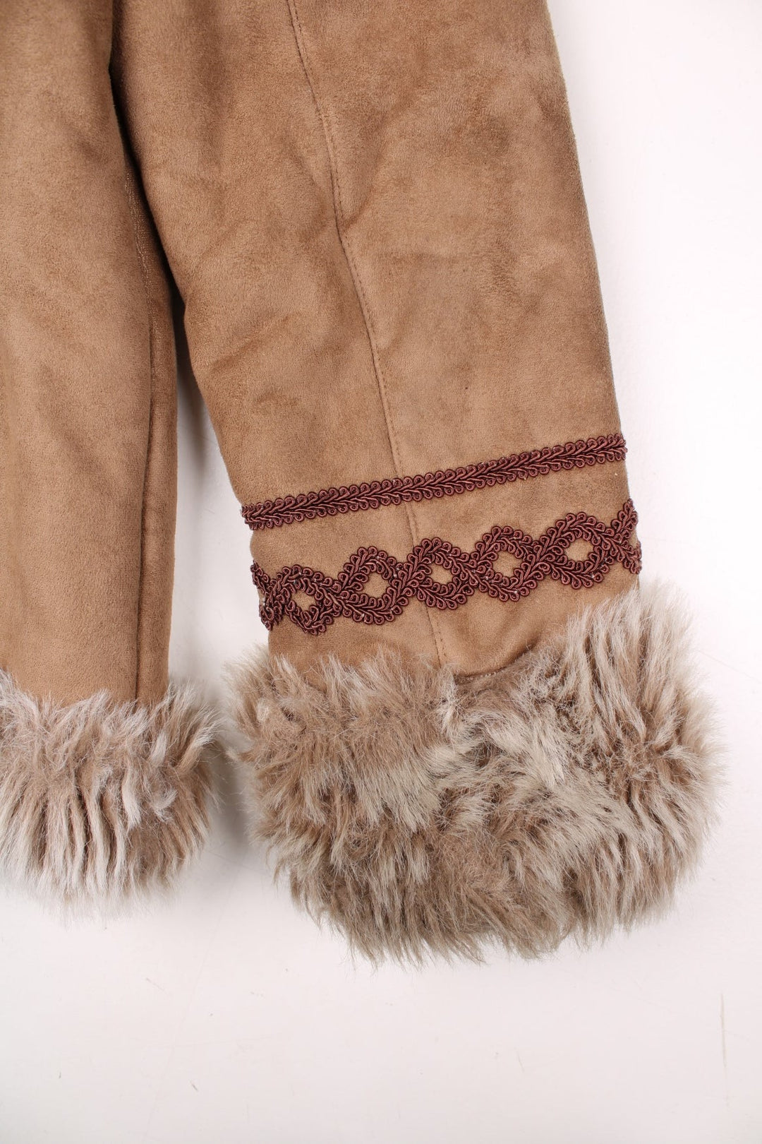 Y2K Fiorelli suede-effect afghan coat in tan with faux fur trim, toggle closure, and red embroidery.