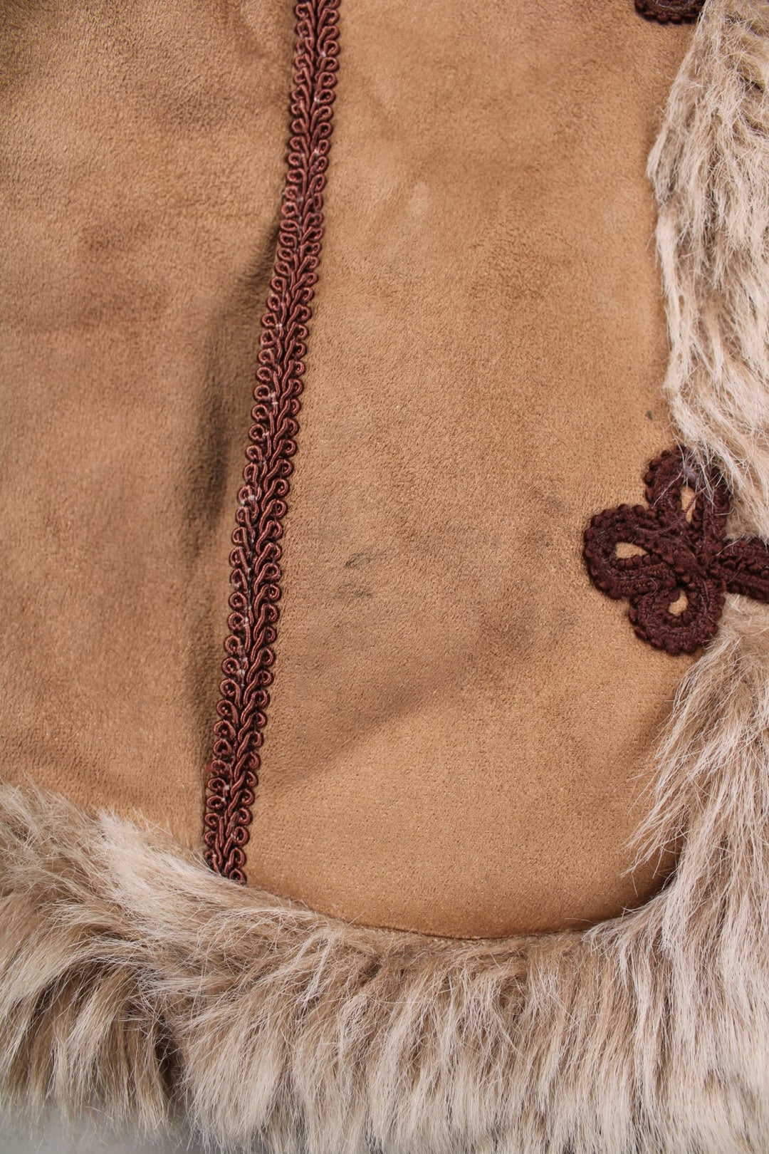 Y2K Fiorelli suede-effect afghan coat in tan with faux fur trim, toggle closure, and red embroidery.