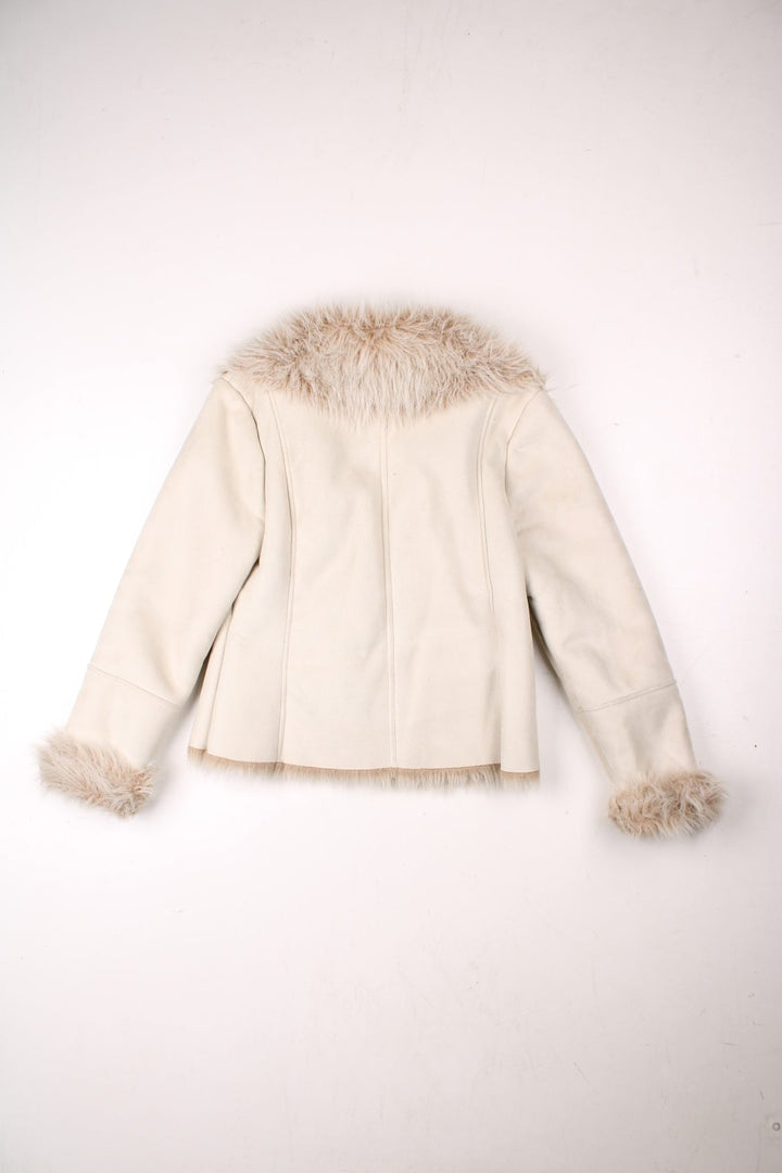 Y2K cropped suede-effect afghan coat in white with faux fur trim and snap closure by Alibi.