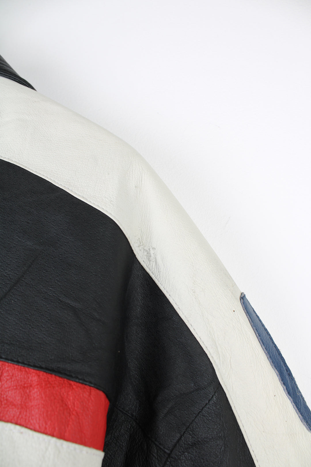 Vintage 90's style USA themed leather bomber jacket with spell-out detailing down the sleeves and USA flag on the back 