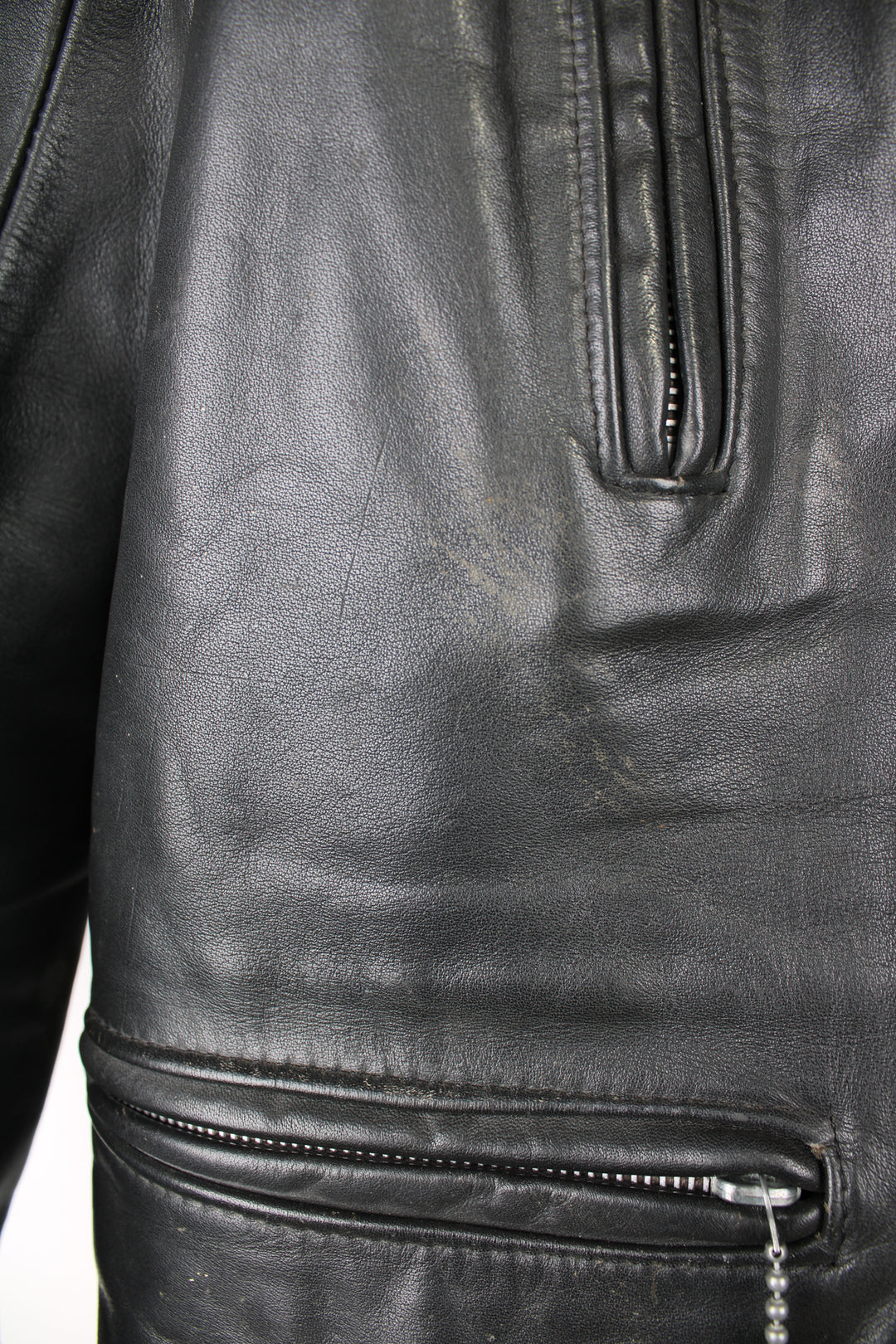 Vintage Highwayman black leather zip through biker jacket, features zip up pockets and adjustable buckle details on the hips