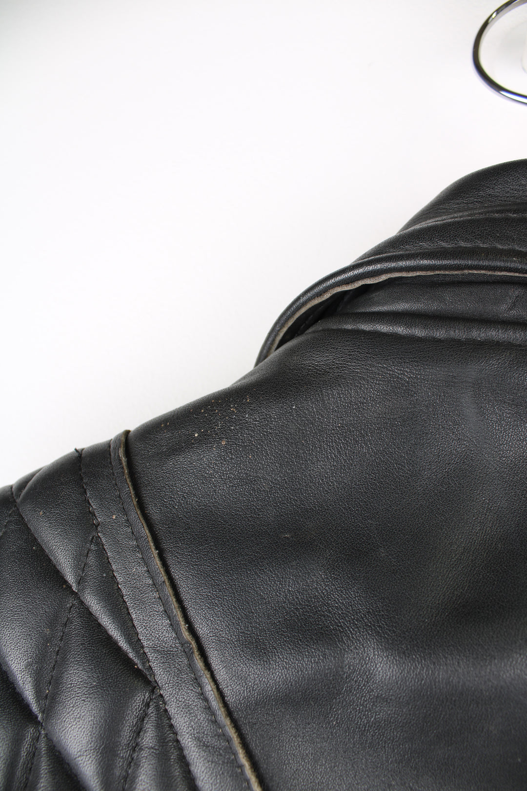 Vintage Highwayman black leather zip through biker jacket, features zip up pockets and adjustable buckle details on the hips