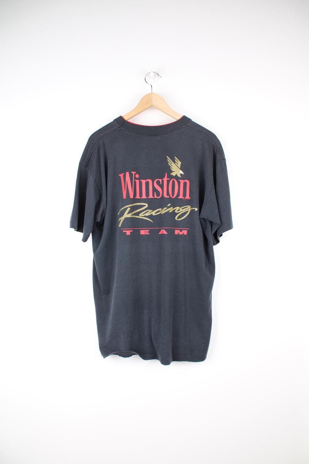 Vintage made in the USA looks like 90's single stitch Winston Racing t-shirt with chest pocket and printed graphics on the front and back 