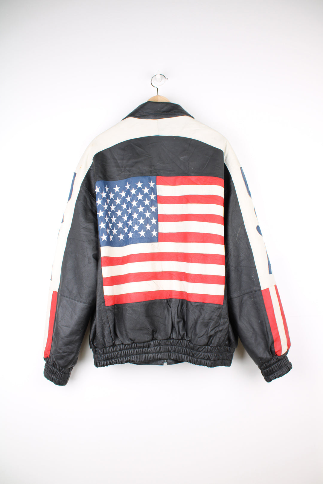 Vintage 90's style USA themed leather bomber jacket with spell-out detailing down the sleeves and USA flag on the back 