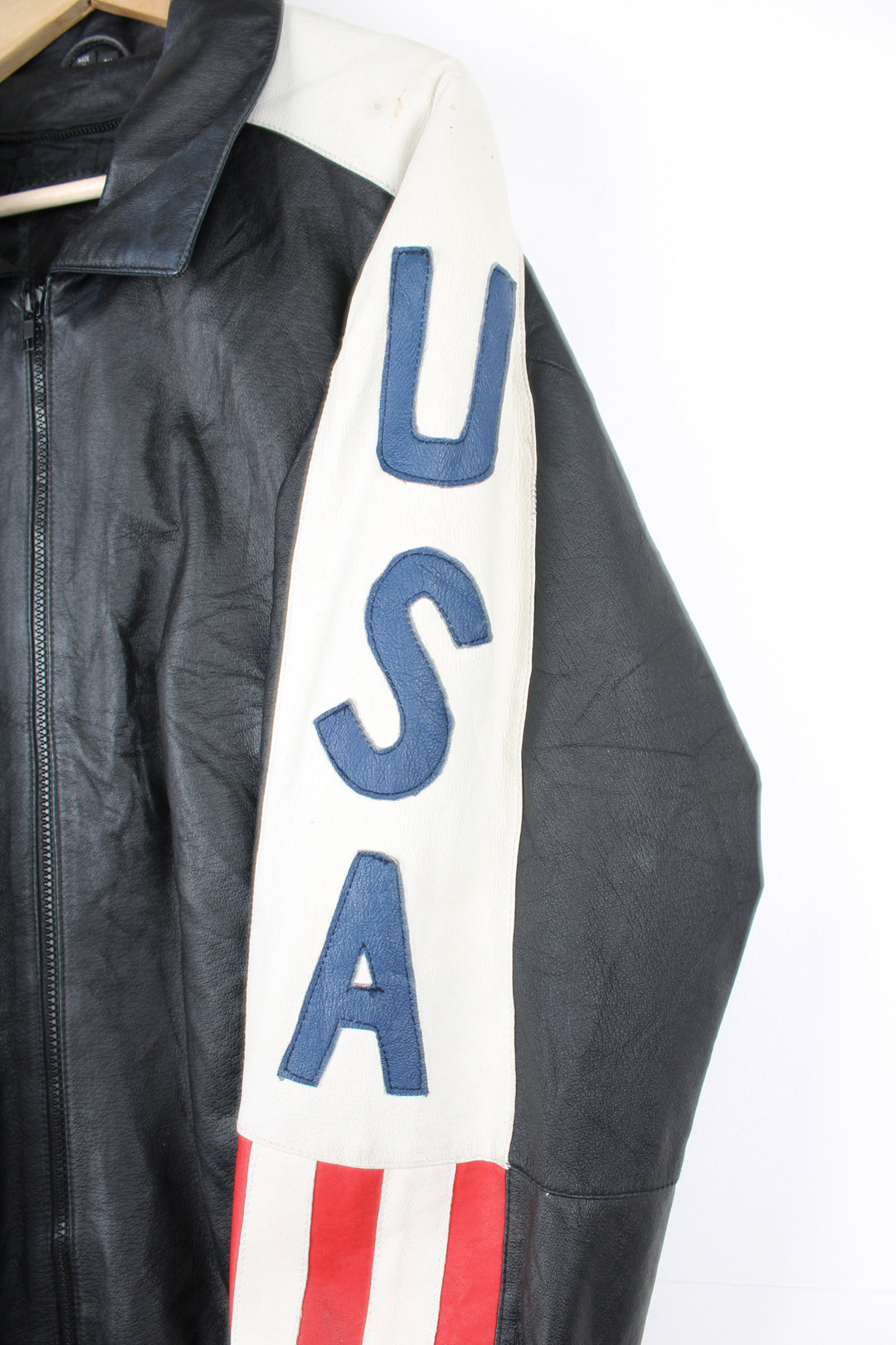 Vintage 90's style USA themed leather bomber jacket with spell-out detailing down the sleeves and USA flag on the back 