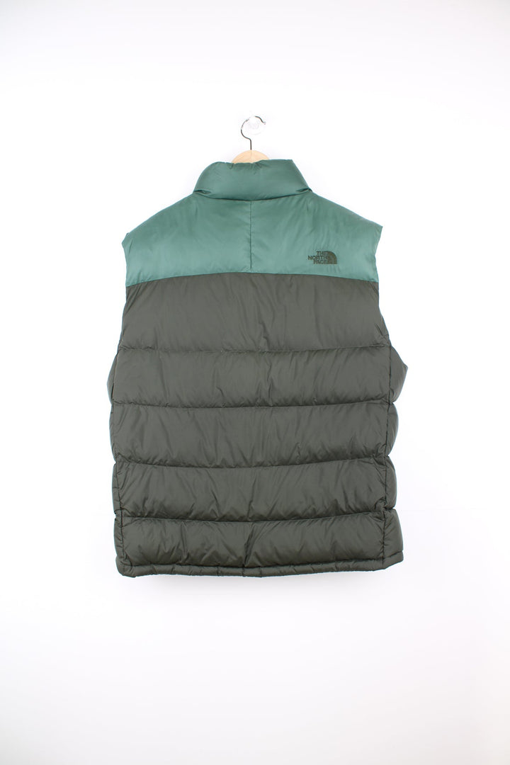 The North Face puffer gilet in green featuring embroidered logo on the chest. 