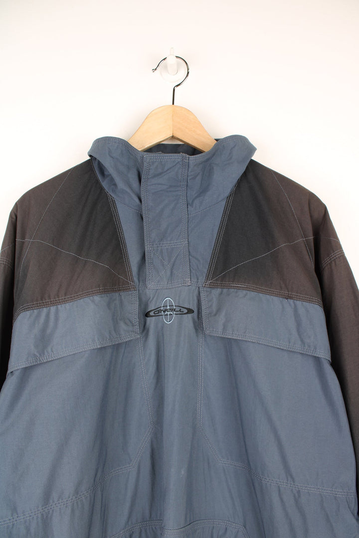 Vintage O'Neill "Sno Wear" pullover jacket with quarter zip. Features embroidered logo.