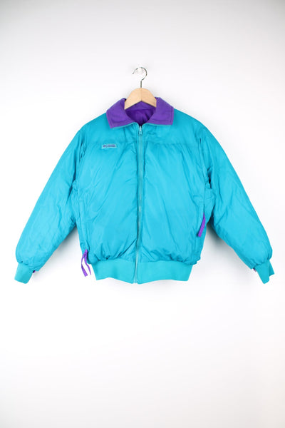 Vintage Columbia reversible puffer jacket in purple and green. Features puff print logo on the chest.