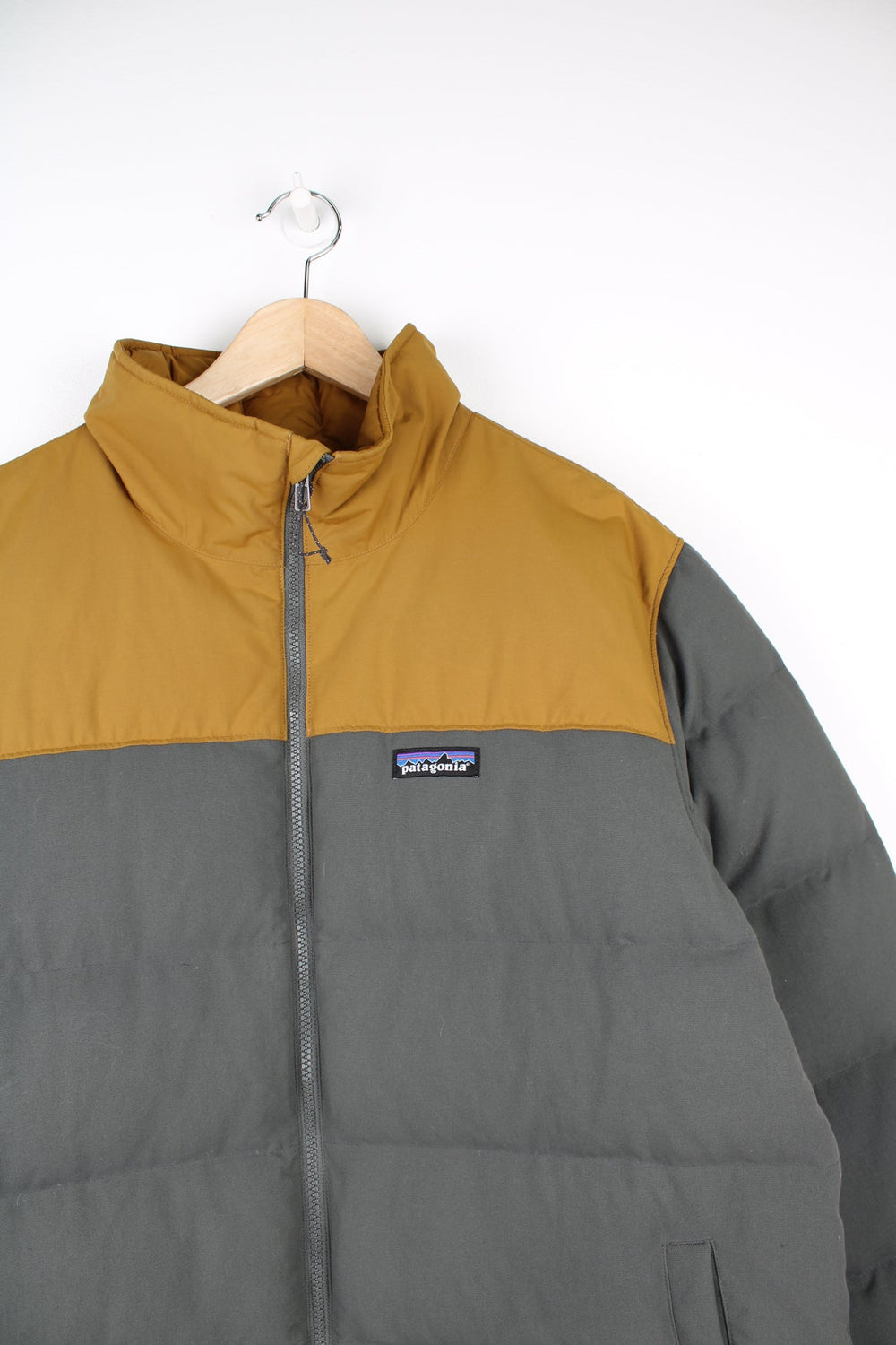 Patagonia Bivy duck down puffer jacket in grey and yellow.