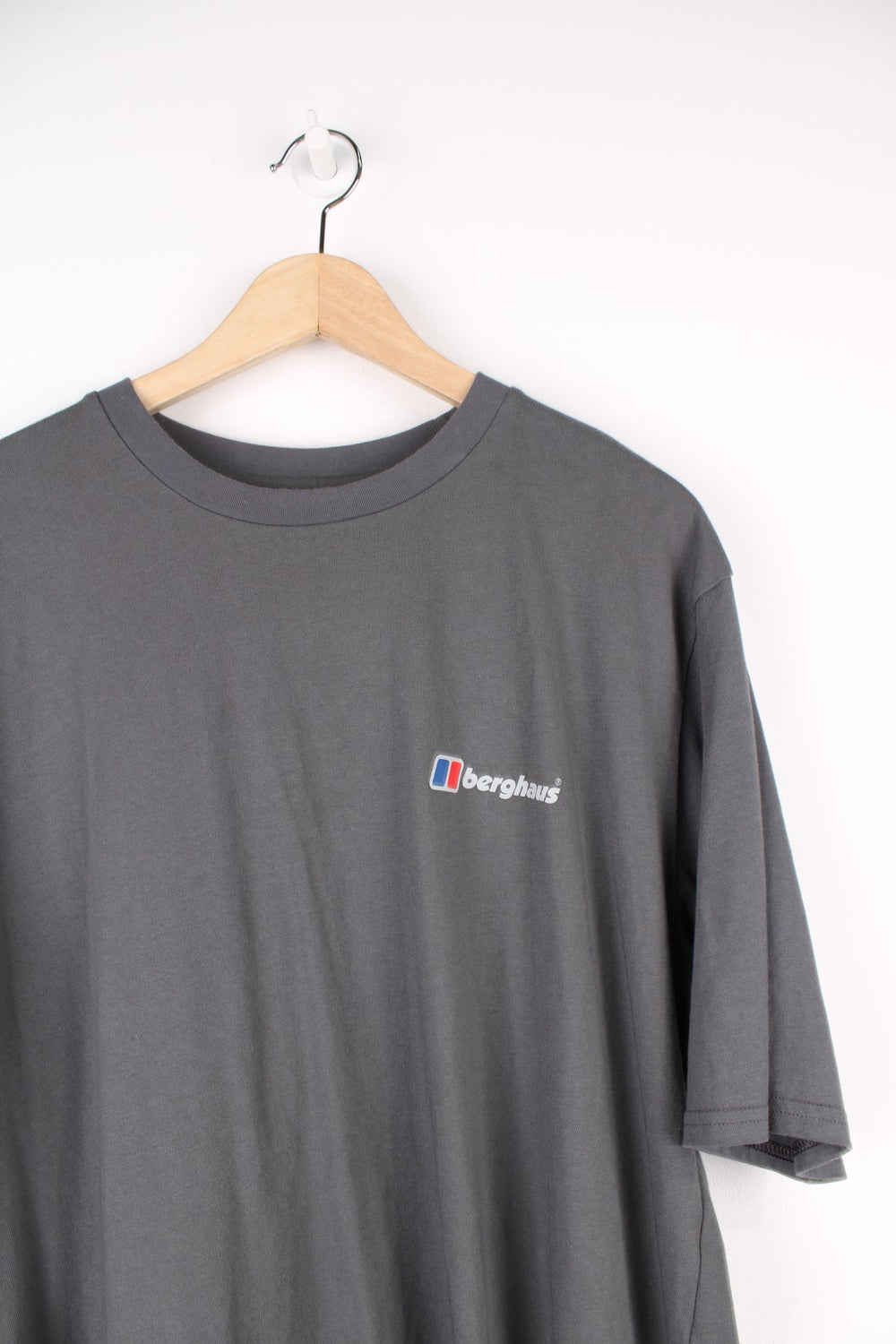 Grey Berghaus T-Shirt with printed logo on the chest and graphic print on the back.