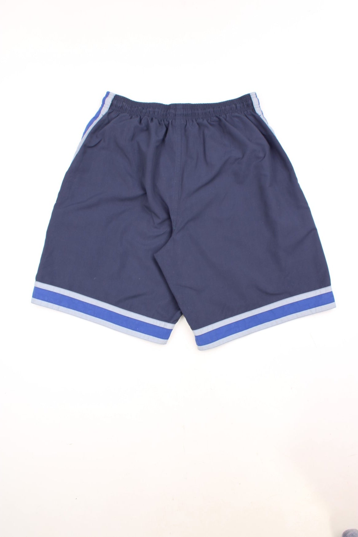 Reebok Shorts in a blue and grey colourway, has an elasticated waist, side pockets, mesh netted lining, and the logo embroidered on the front. 