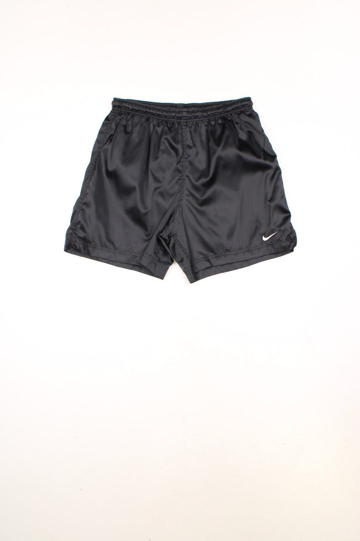 Nike Running Shorts in a black colourway, has an elasticated waist with drawstrings, no pockets, and the swoosh logo is embroidered on the front and back. 