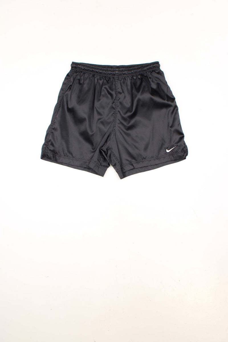 Nike Running Shorts in a black colourway, has an elasticated waist with drawstrings, no pockets, and the swoosh logo is embroidered on the front and back. 