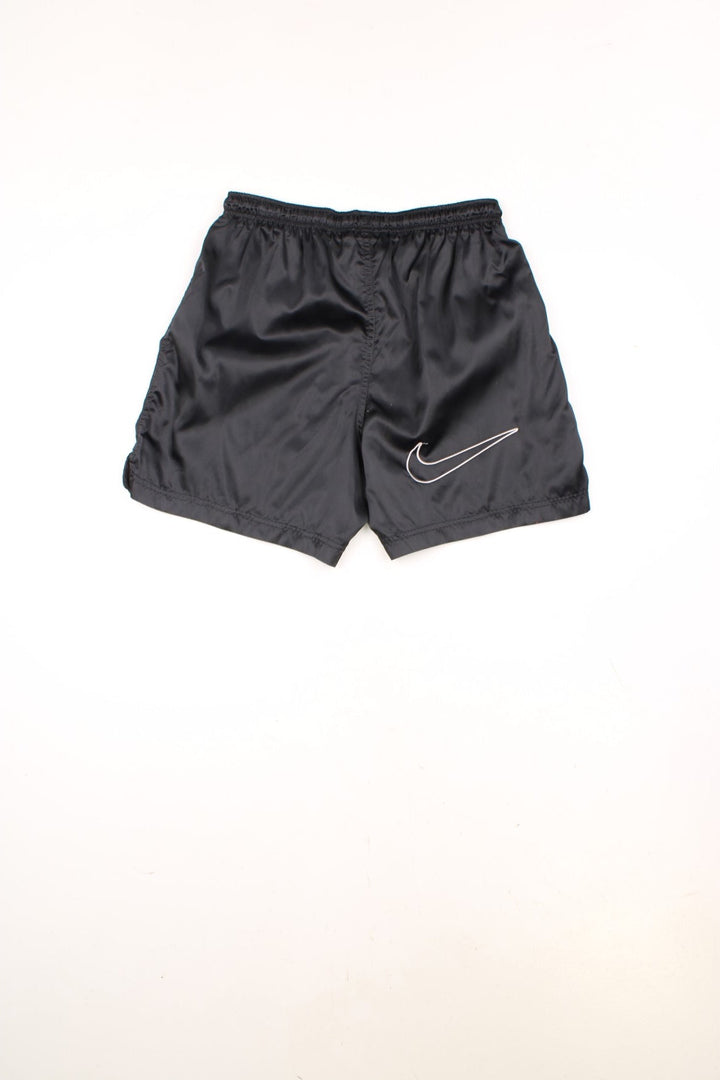 Nike Running Shorts in a black colourway, has an elasticated waist with drawstrings, no pockets, and the swoosh logo is embroidered on the front and back. 