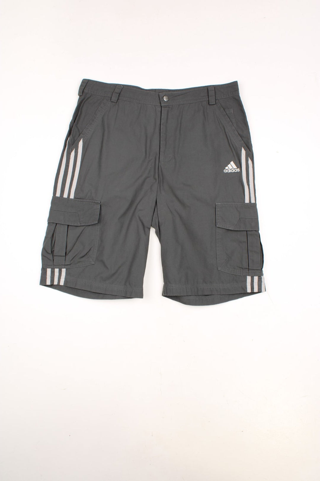 Adidas Cargo Shorts in a grey colourway with the iconic three stripes going down the sides, has multiple pockets, and the logo embroidered on the front. 