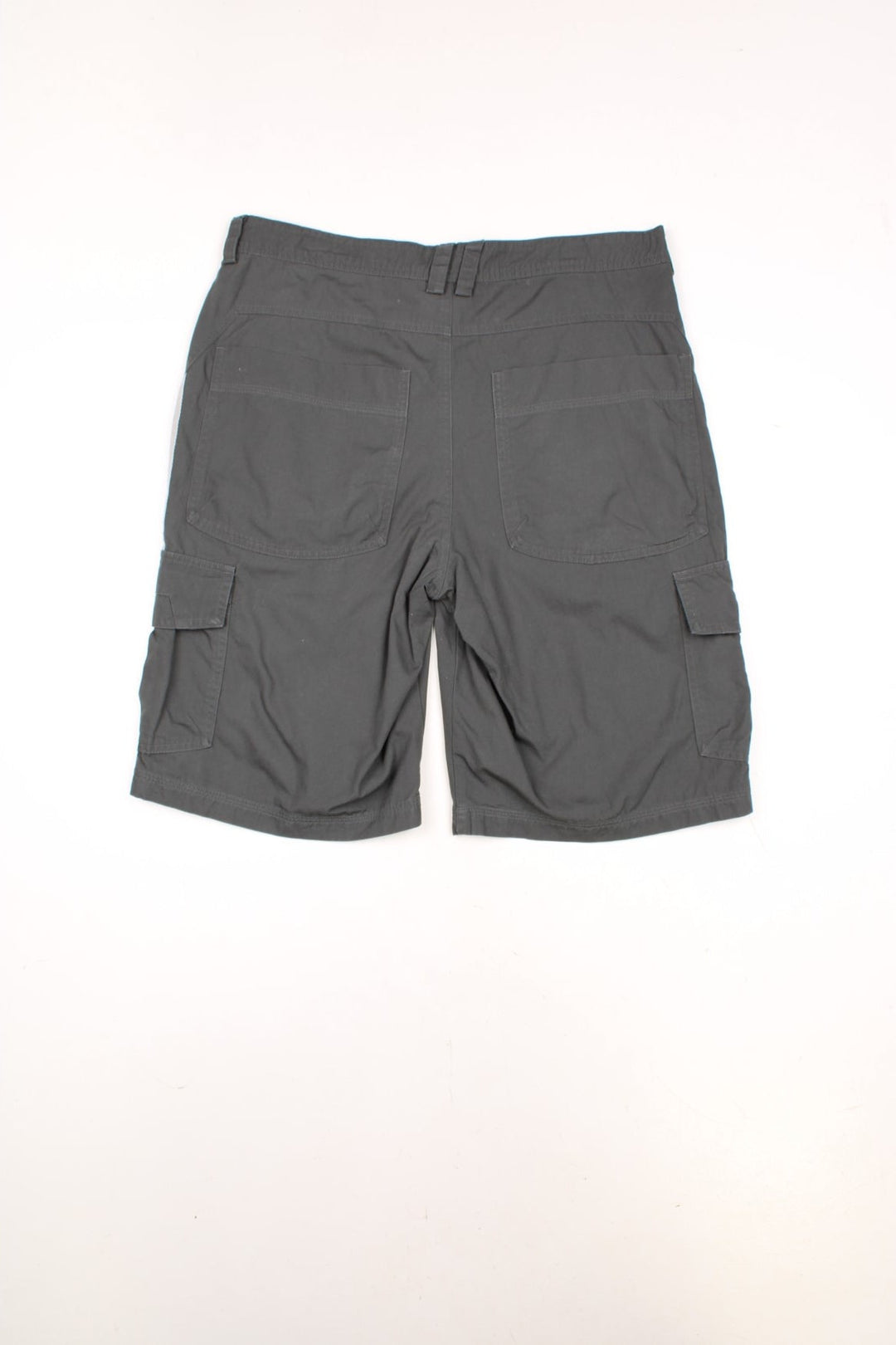 Adidas Cargo Shorts in a grey colourway with the iconic three stripes going down the sides, has multiple pockets, and the logo embroidered on the front. 