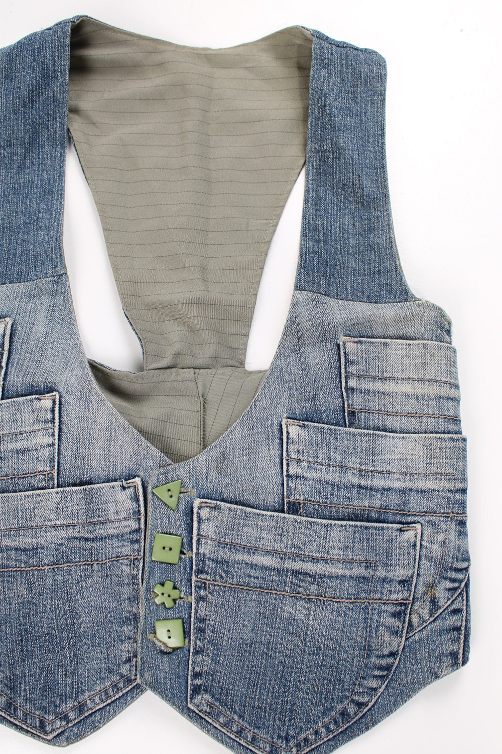 Y2K stone wash denim waistcoat with multipul pockets and green abstract buttons.  good condition - faint mark on one pocket  Size in Label:   No Size Label - Measures like a womens S