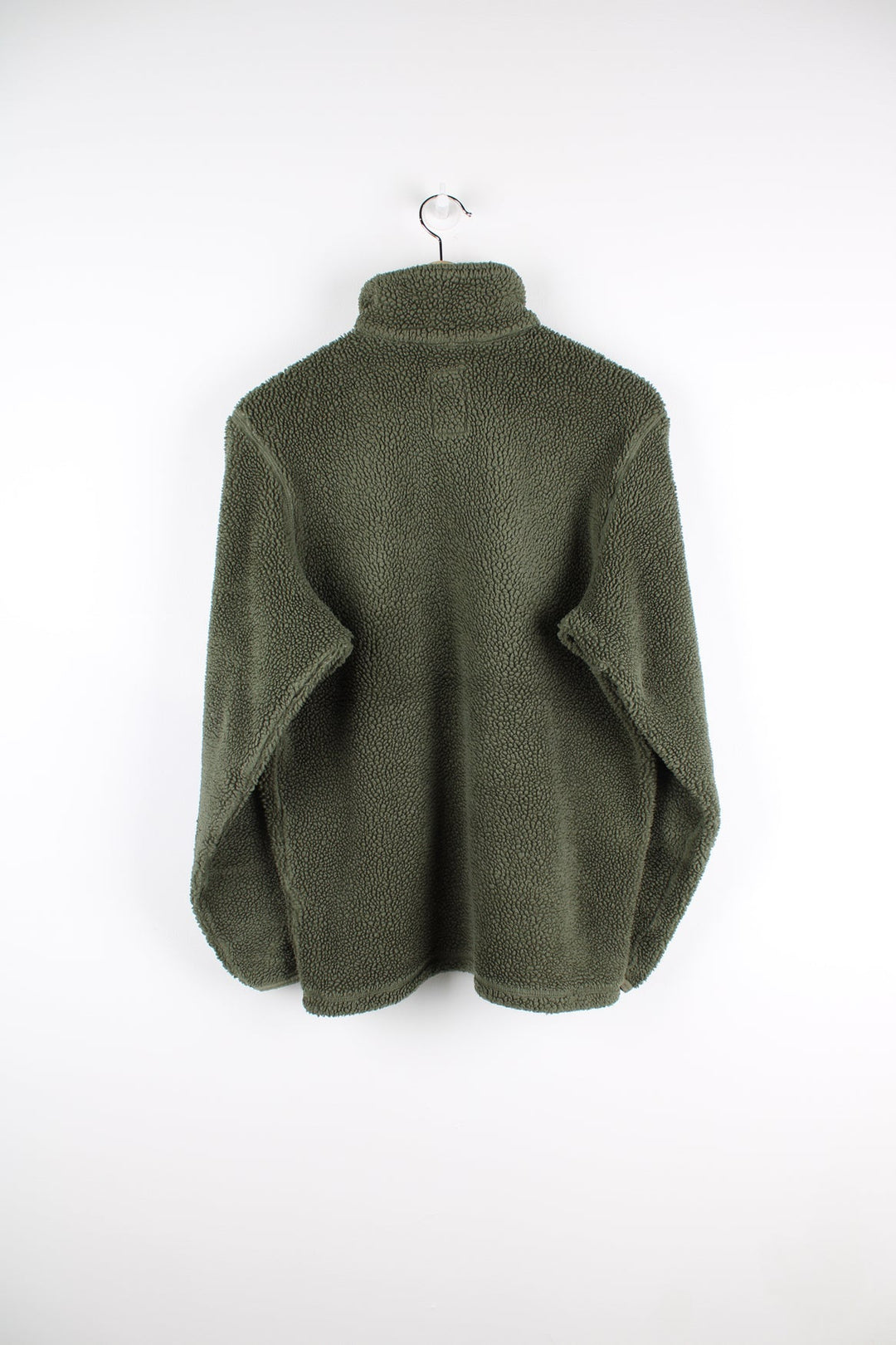 Green Nike ACG teddy style fleece with pocket on the chest.