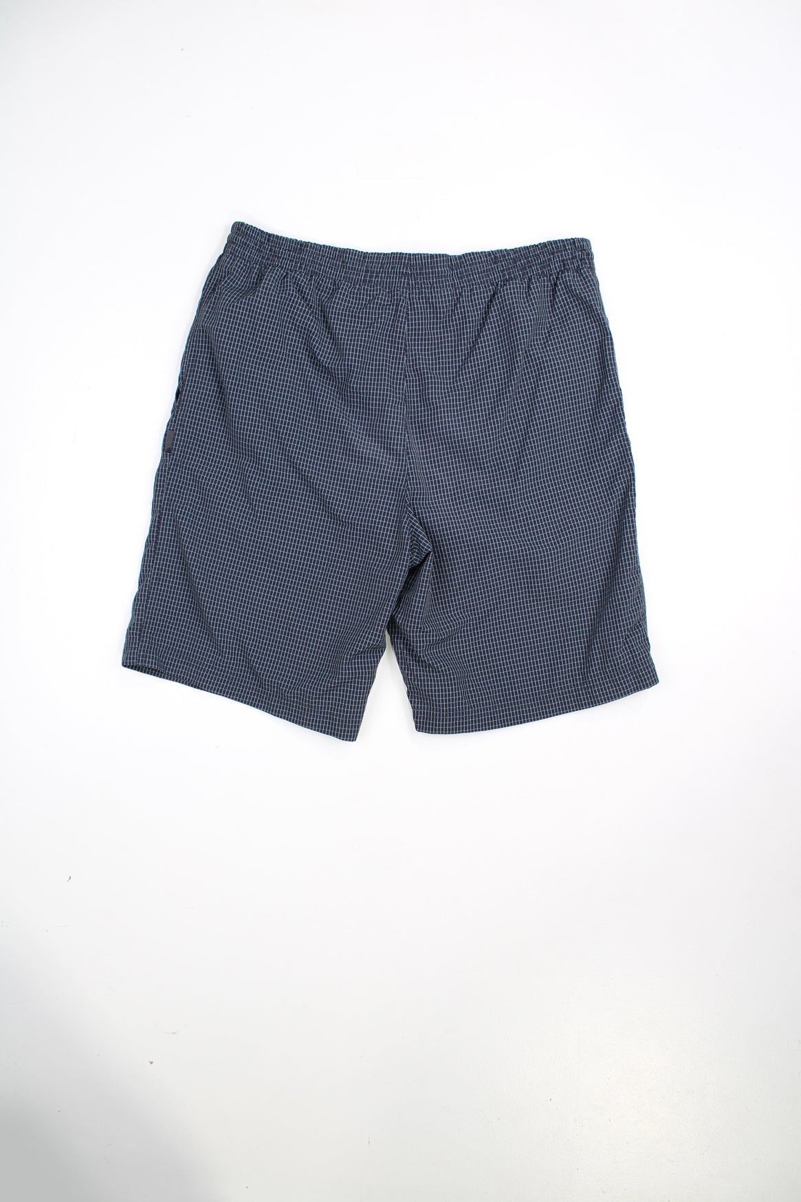 Grey Adidas shorts with blue checks, elasticated waist and drawstring. Features embroidered logo.